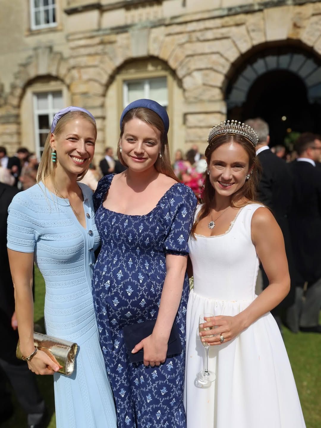 Image may contain Lady Gabriella Kingston Person Photobombing Adult Wedding Accessories People Clothing and Dress