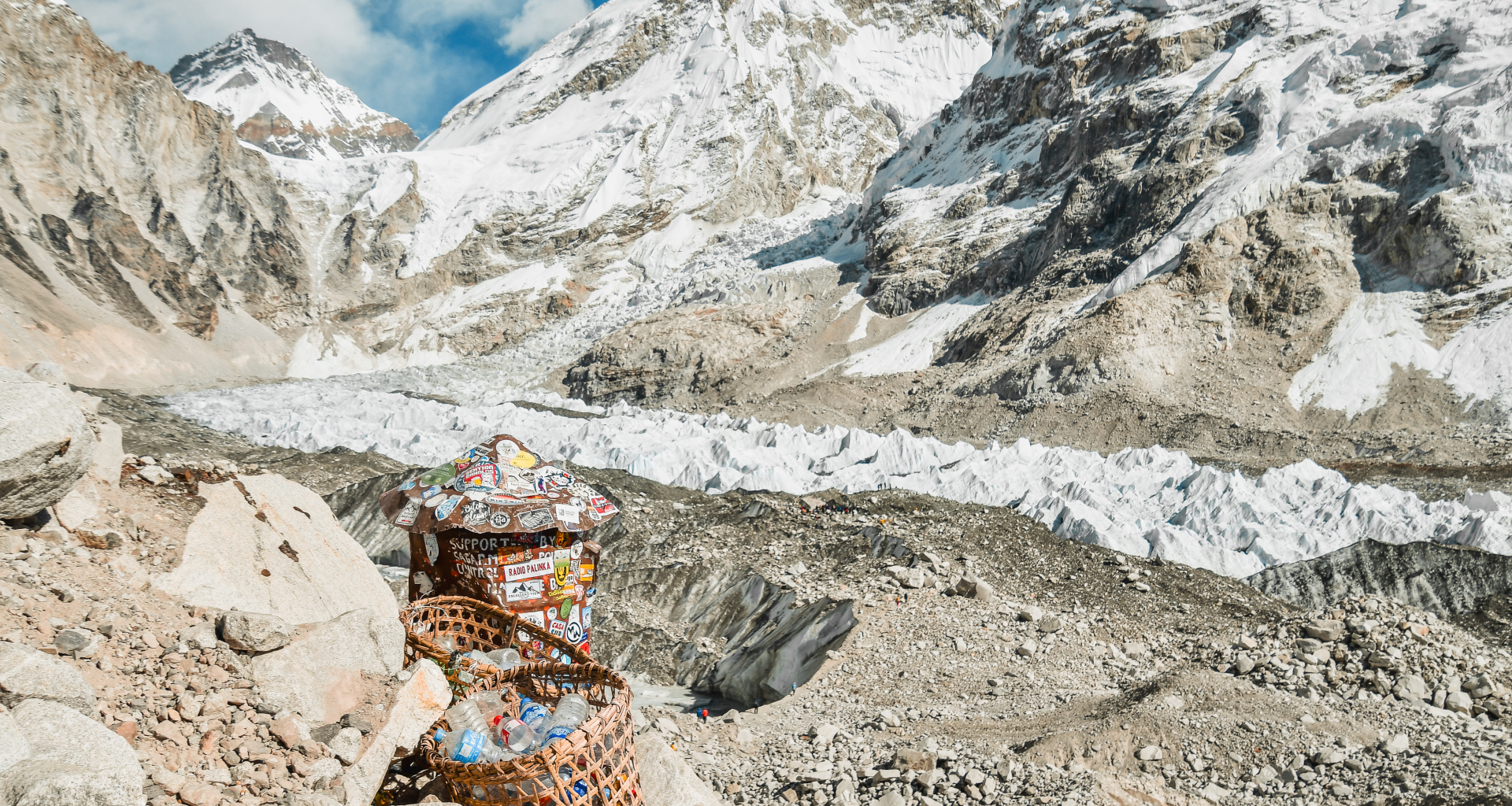 baskets of trash on mount everest