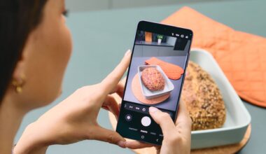 A woman takes a photo of a loaf of bread using a Samsung Galaxy S26 Ultra
