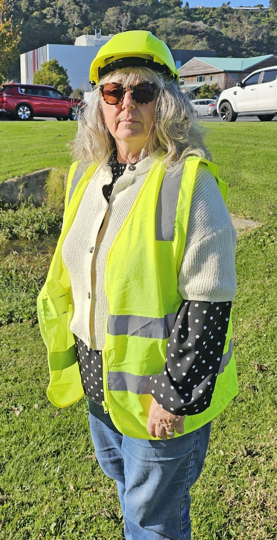 Waiotahe resident Maree Scammell and her neighbours have put together a kit of safety gear to deal with crashes on their corner of State Highway 2, as they have become so frequent. Photo / Diane McCarthy