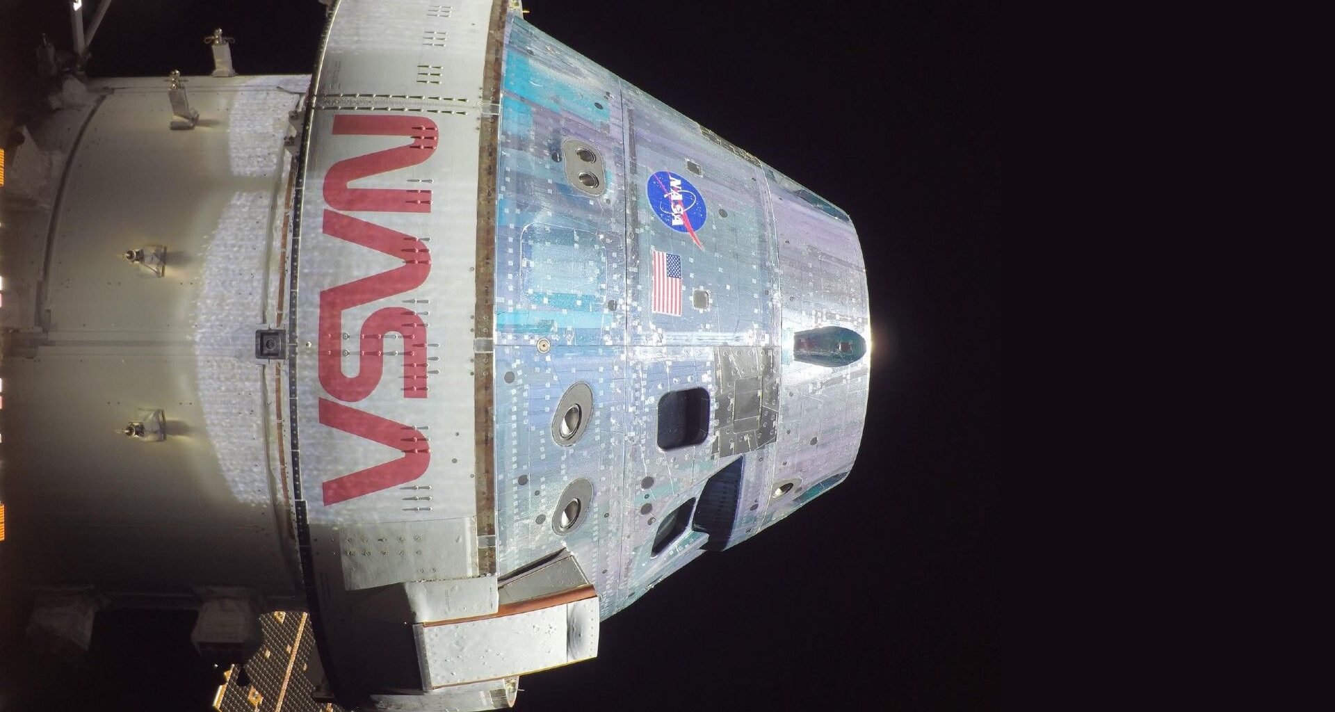 a silver cone-shaped spacecraft in space