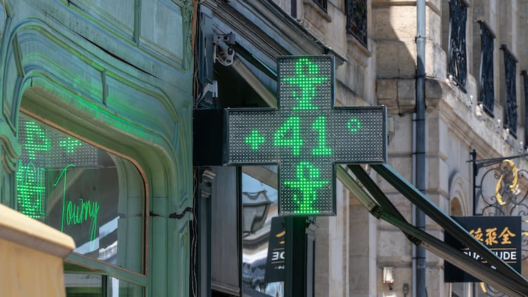 A drugstore sign shows the temperature of 41 degrees Celsius (105,8 degrees Fahrenheit) in Bordeaux, southwestern France.