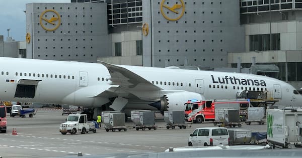 Workers injured after plane's nose falls to ground at German airport