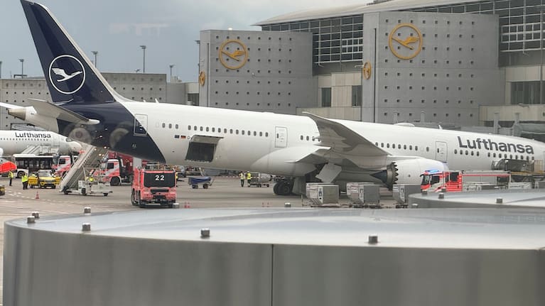A Lufthansa 'Dreamliner' aircraft lies on its nose in front of a terminal at the Frankfurt Airport in Frankfurt, Germany, Thursday, June 4, 2026, after the nose landing gear collapsed.