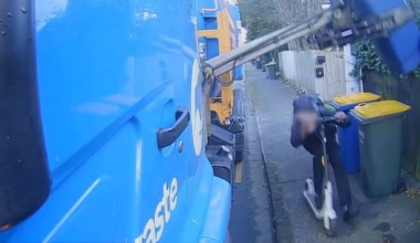 Watch: E-scooter rider narrowly avoids rubbish truck side loader