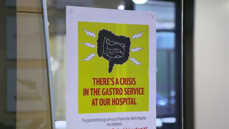 A sign outside a public meeting on a severe specialist doctor shortage in Manawatū.
