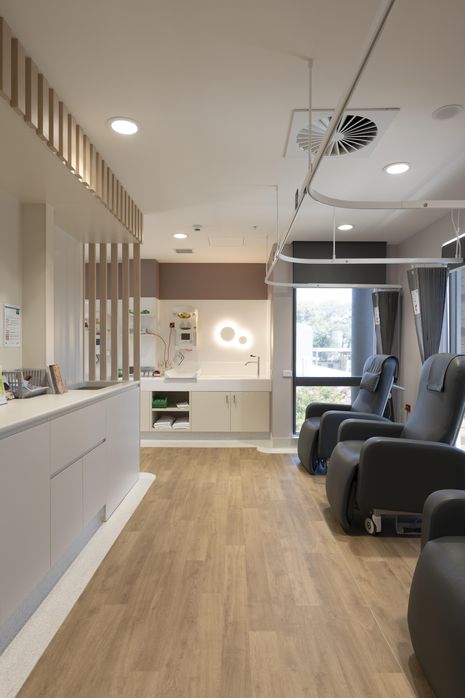 A calming material palette and soft furnishings were selected to provide a comfortable environment for new parents.