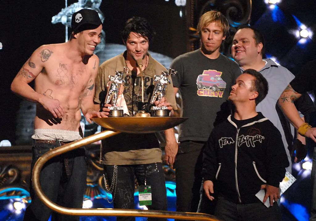 Margera (centre) was a central member of the Jackass cast before his 2022 firing (KMazur/WireImage)