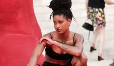 Willow Smith turns heads in crop top, tailored shorts and sculptural braided updo at Paris Fashion Week