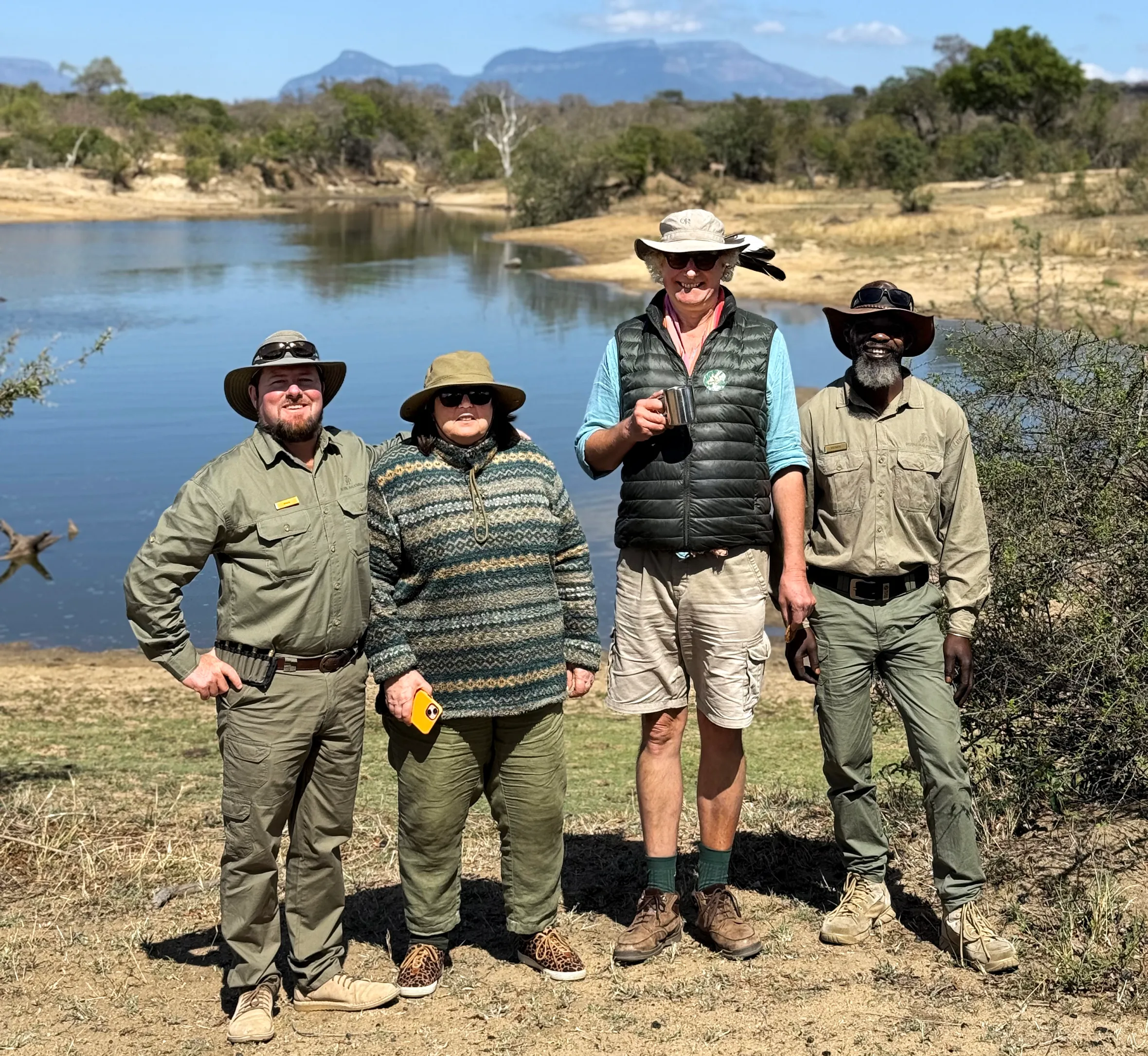 Safari guide Ryan Jack, Times reader Geva Blackett, Simon Blackett and tracker Mumps in Kruger National Park, South Africa