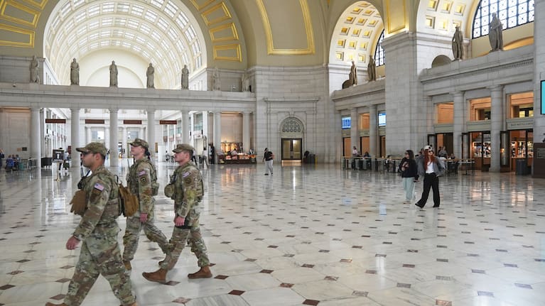 Members of the National Guard walking in the lobby of Union Station in Washington