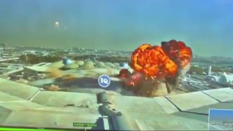 An explosion following an Iranian strike at Kuwait's main airport. 