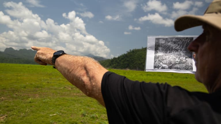 Andrew Snow, a researcher with the Thailand-Burma Railway Centre, uses historic aerial photographs from The National Archives in London to map out the layout of Nithe Station