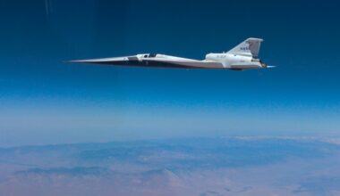 A sleek plane floats in the sky