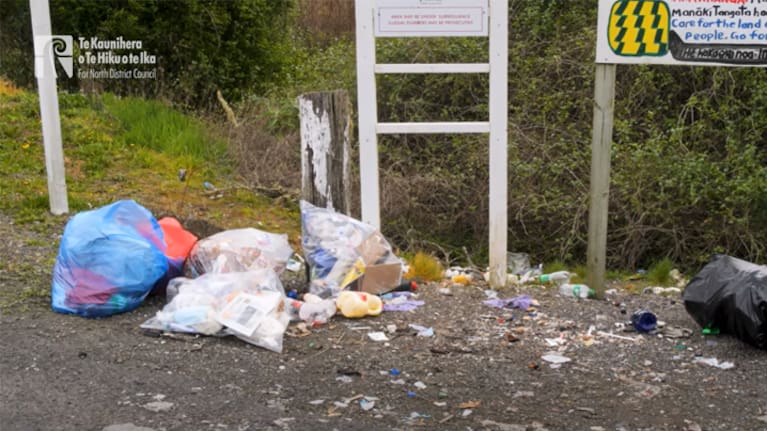 Bags of rubbish next to a 'no dumping' sign in Kerikeri. (Source: Far North District Council)