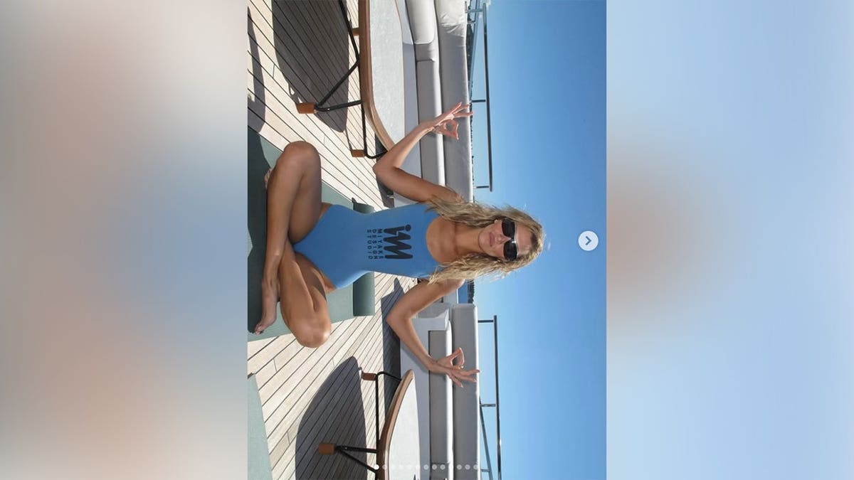 Bella Hadid meditating on a yacht in 2026.