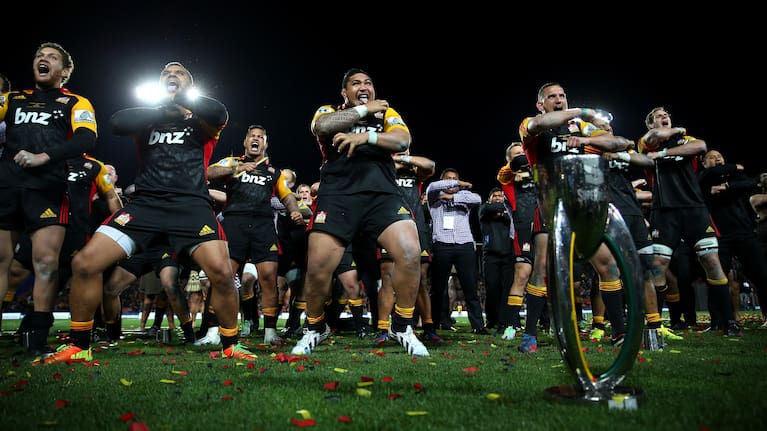 Ben Tameifuna, centre, performs a haka with the Chiefs after they won the Super Rugby grand final against the Brumbies in 2013.