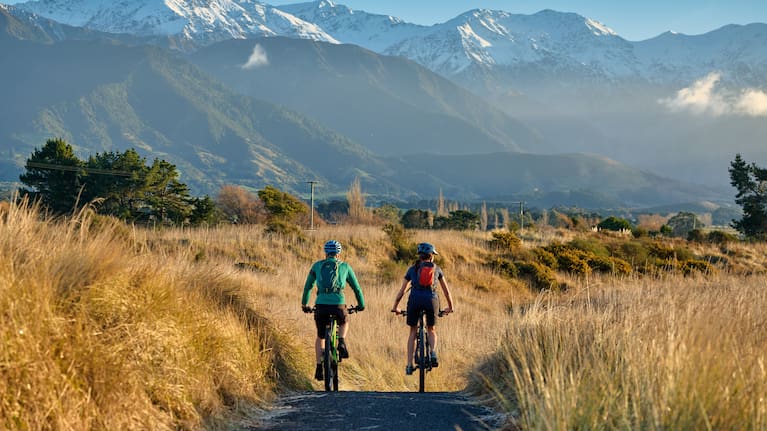 Cyclists ride The Whale Trail.