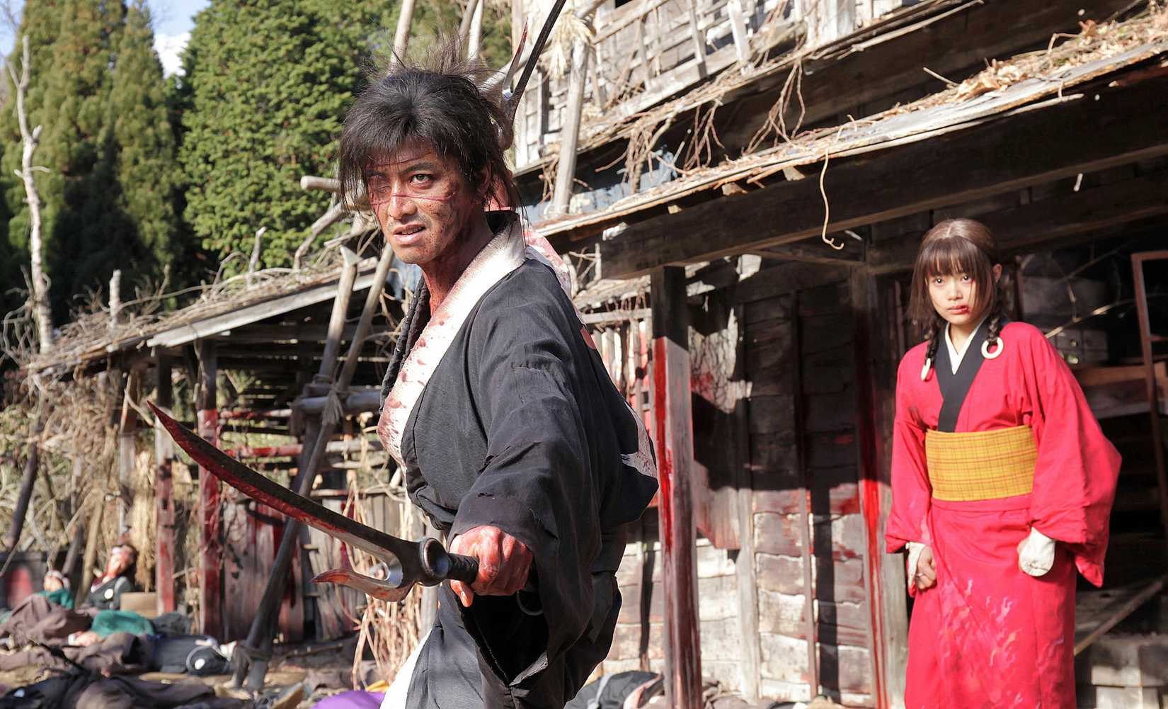 A scene from Blade of the Immortal, showing a samurai and a young girl
