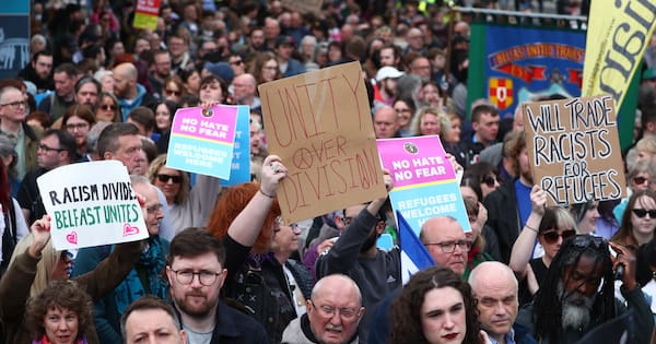 Thousands rally in Belfast to condemn anti-immigrant rioting
