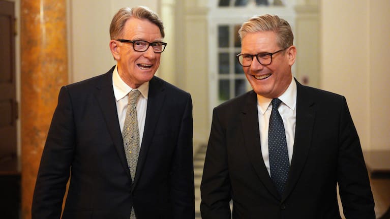 British Prime Minister Keir Starmer, right, talks with Britain's ambassador to the United States Peter Mandelson during a welcome reception at the ambassador's residence on Wednesday, Feb. 26, 2025