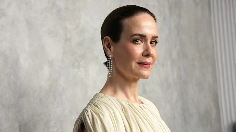 Sarah Paulson in a cream dress
