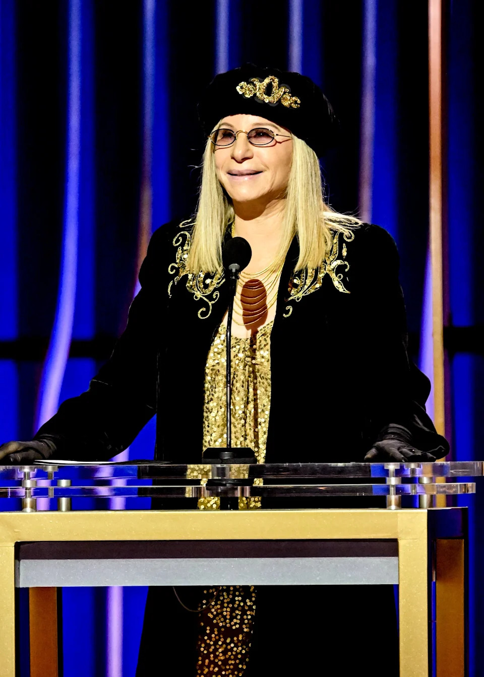 Barbra Streisand at a podium
