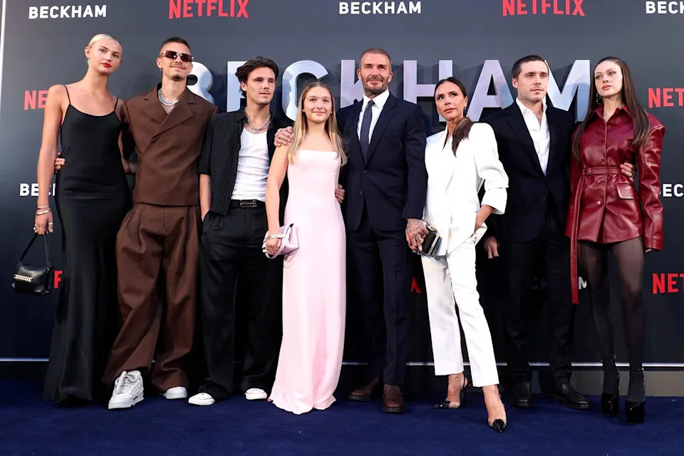(From left to right): Mia Regan, Brooklyn Peltz Beckham, David Beckham, Harper Beckham, Cruz Beckham, Romeo Beckham, Victoria Beckham and Nicola Peltz Beckham in London in October 2023.Credit: Mike Marsland/WireImage