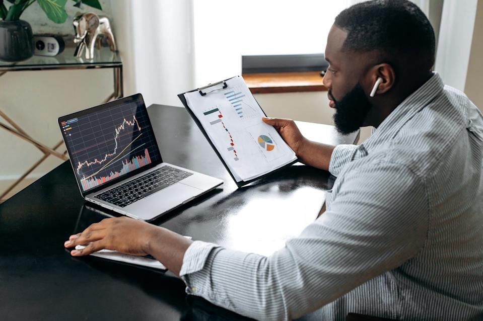 Investor analyzing stocks.