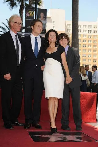 Julia Louis-Dreyfus and Brad Hall in 2010Credit: ROBYN BECK/AFP/Getty