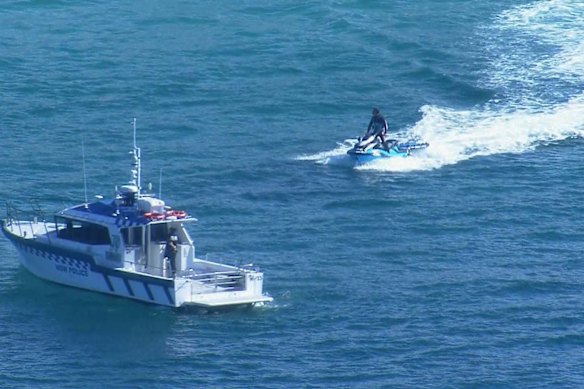 A police boat ay Sydney’s Coogee beach after this month’s shark attack.