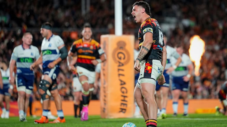 Chiefs player Reon Paul celebrates after scoring against the Blues in Hamilton last weekend.