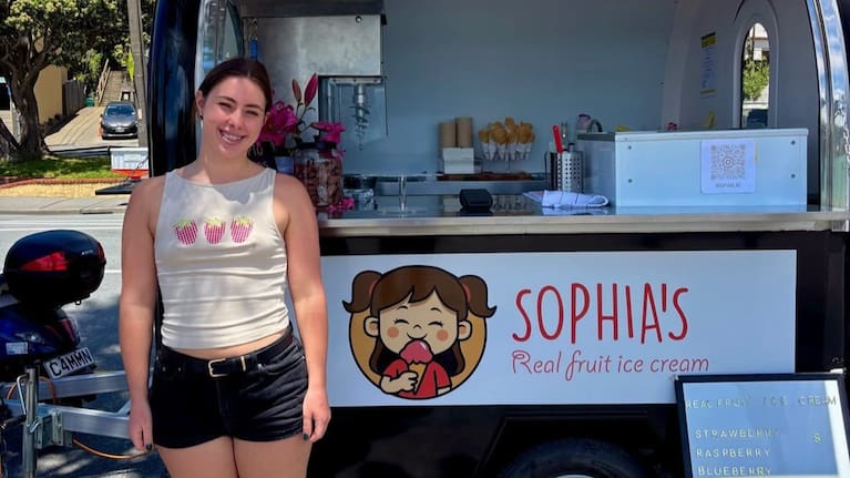 Claudia Hopkins with her ice cream cart in Oriental Bay, Wellington.
