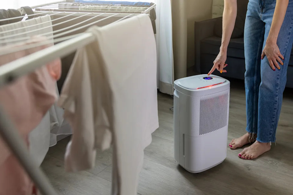 The dehumidifier removes that moisture from the air, which helps clothes dry much faster.