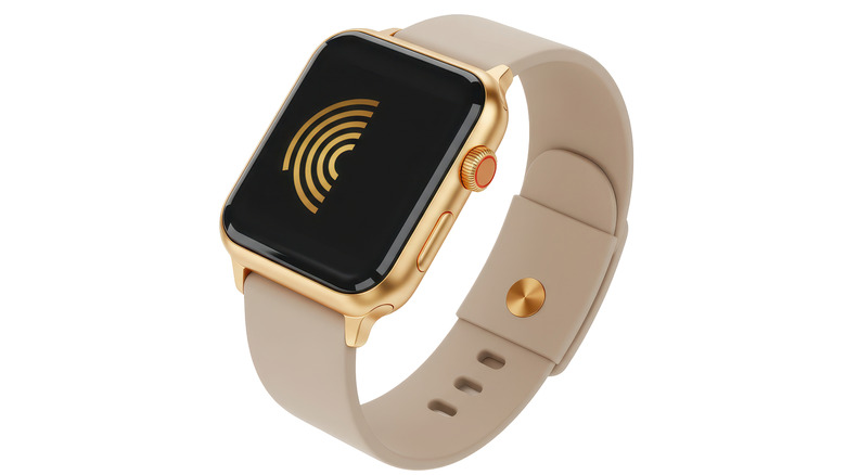 A gold and beige smartwatch on a white background.
