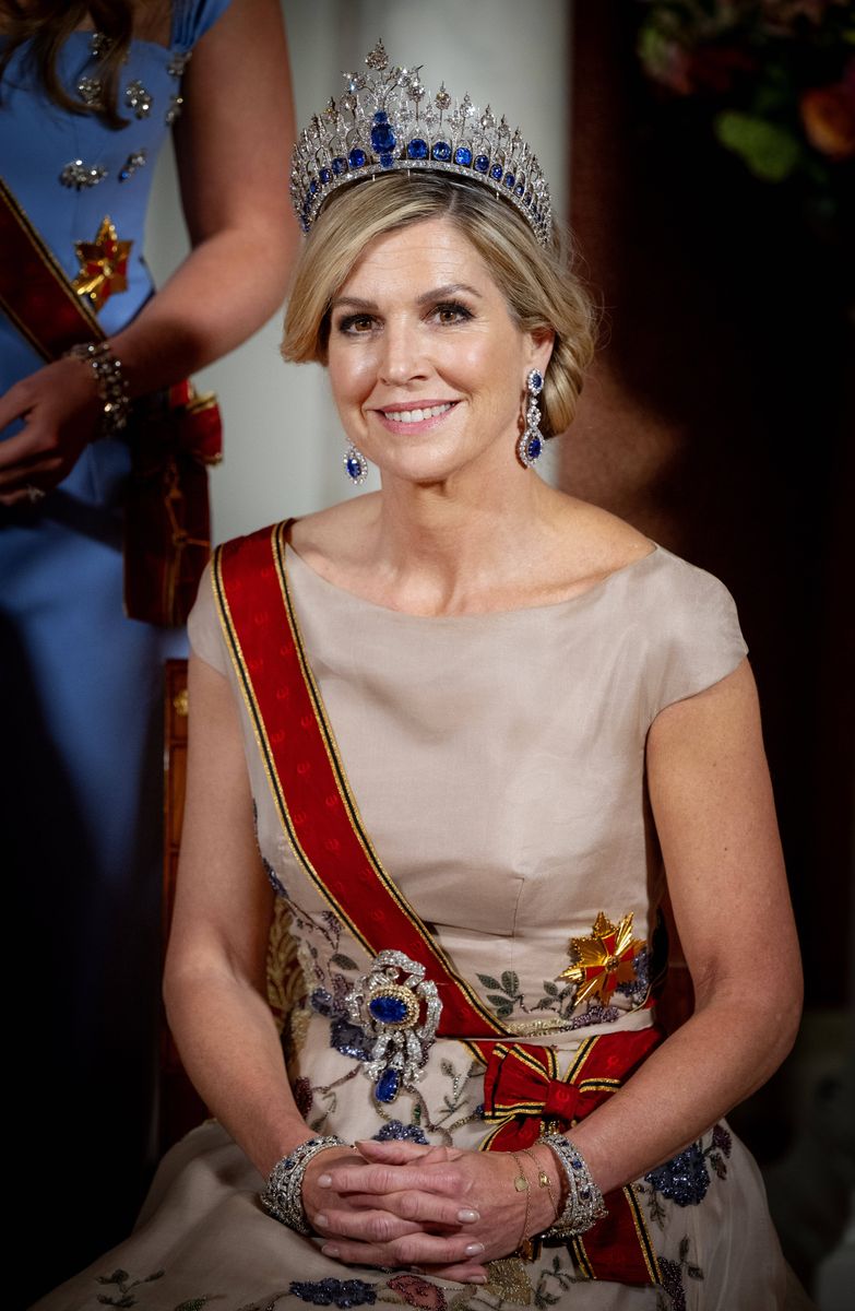 Queen Máxima surprises in sapphire tiara with 665 diamonds and 33 sapphires as Princess Amalia revives her star tiara