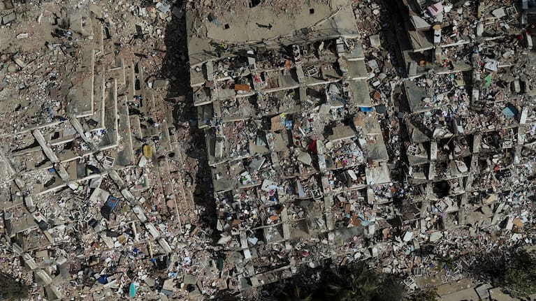 Damaged buildings are seen three days after earthquakes struck in La Guaira, Venezuela.