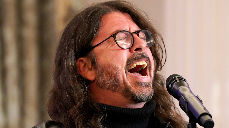 Dave Grohl wailing into microphone