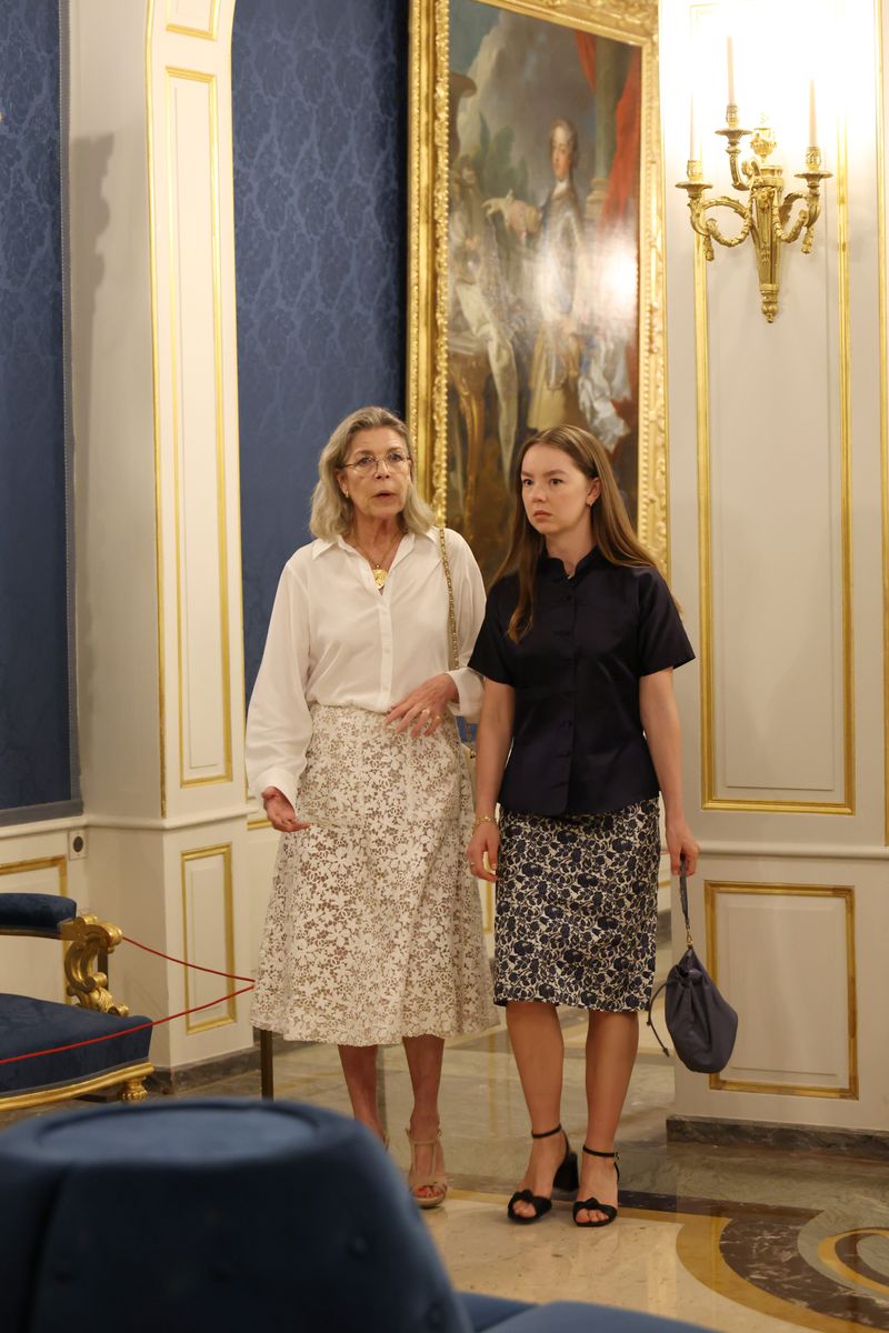 Alexandra of Hanover coordinated with her mother in a chic black top and floral midi skirt for the family outing at Monaco's Prince's Palace.