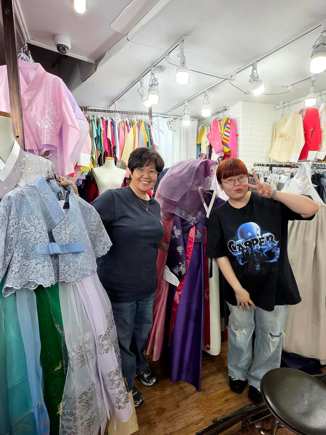 Lee Hyeon-ae (left) and her daughter Kim Ji-won, at their stall, Unhyeon Judan, in Gwangjang Market.