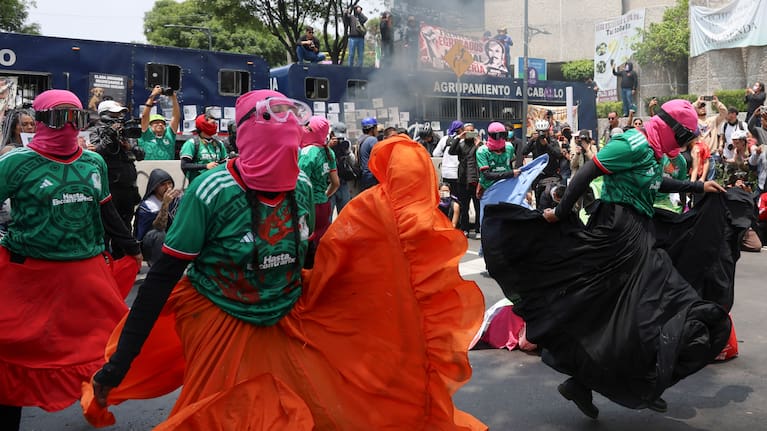 Demonstrators perform during a march protesting prior to the opening day of the 2026 FIFA World Cup in Mexico City, Thursday, June 11, 2026.