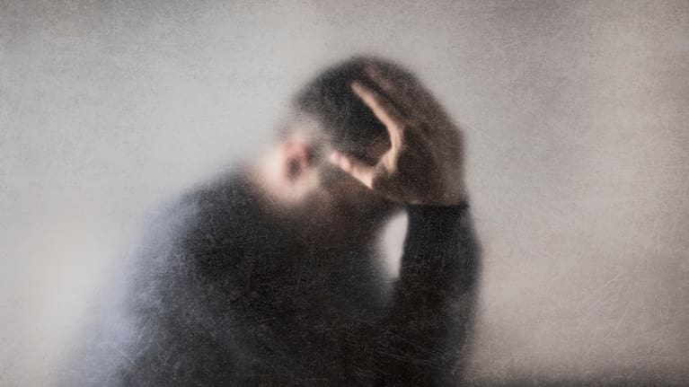 Man with head in hands (file image).