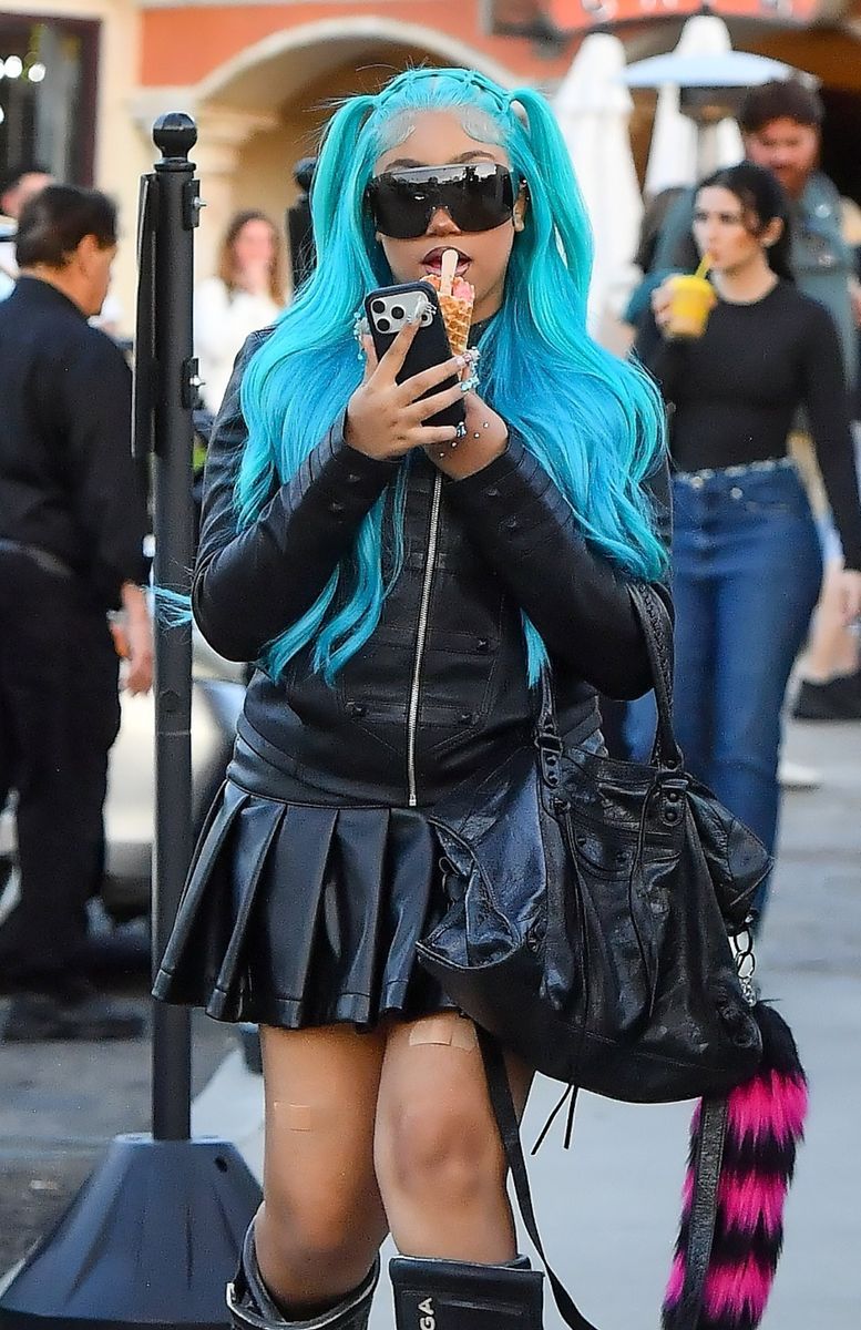 From her hand piercings to her signature blue hair, North West's latest look reflected her fearless sense of style.