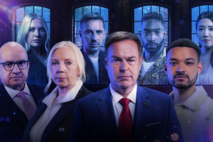 Peter Jones, Deborah Meaden, Touker Suleyman and Steven Bartlett all stood in a row next to each other in front of windows featuring images of Tinie Tempah, Jenna Meek, Susie Ma and Gary Neville.