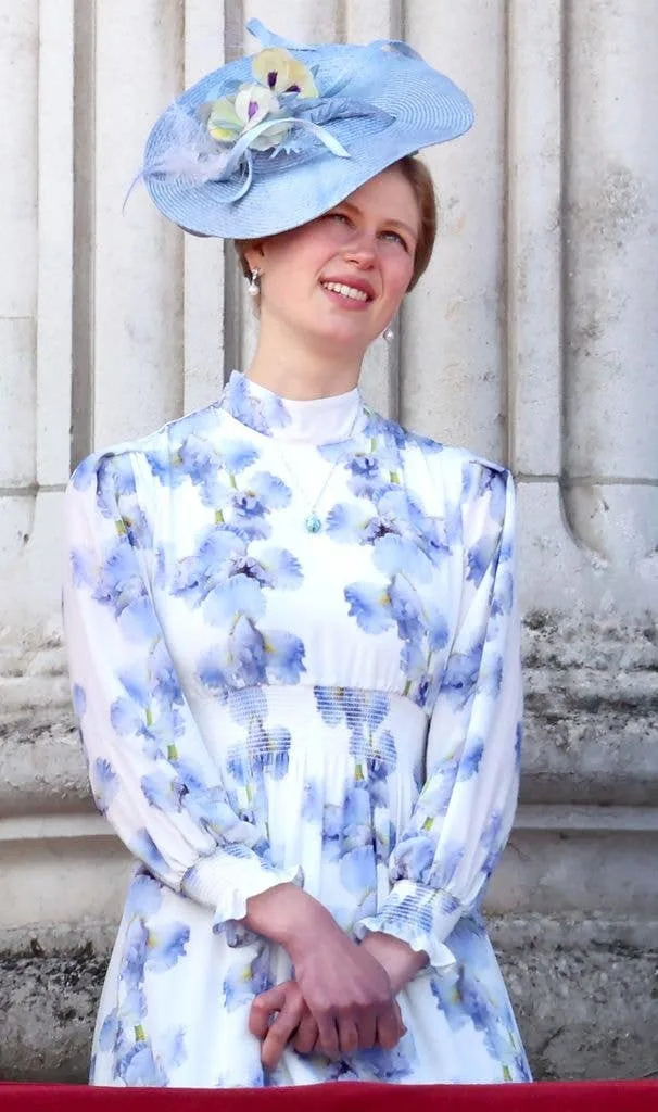A photo of Lady Louise wearing a blue and white dress