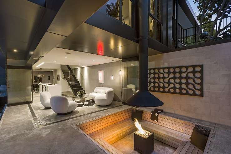 A striking black home on Mainston Road, in Auckland's Remuera, was sold at a mortgagee auction last month. Photo / Supplied