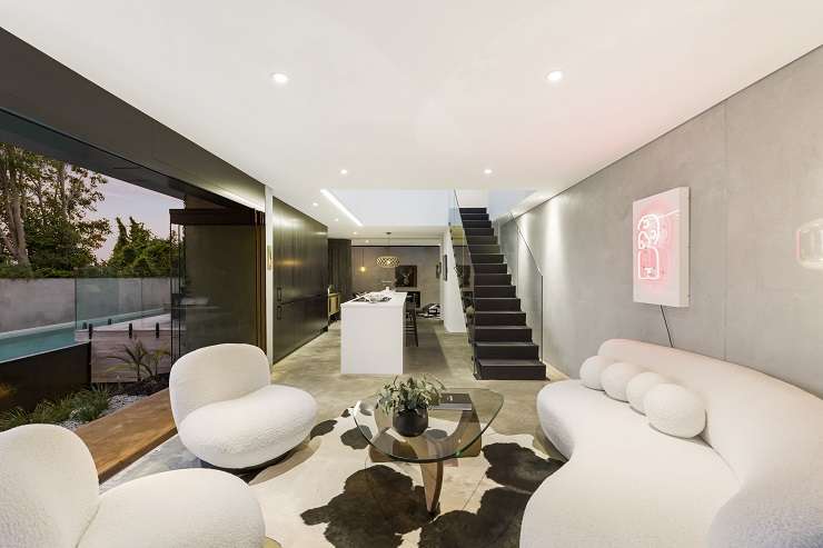 A striking black home on Mainston Road, in Auckland's Remuera, was sold at a mortgagee auction last month. Photo / Supplied