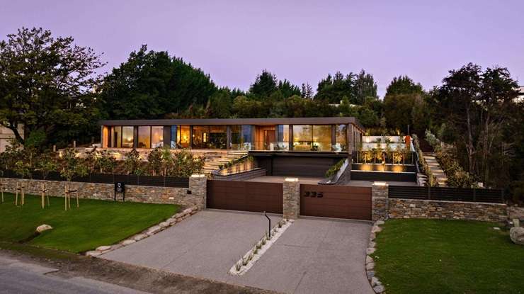 A luxury lodge on Mooney Road, in Speargrass Flat, Queenstown-Lakes, has been snapped up for <img6.5m - $5m over the RV. Photo / Supplied