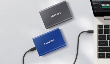 Samsung T7 SSDs next to laptop