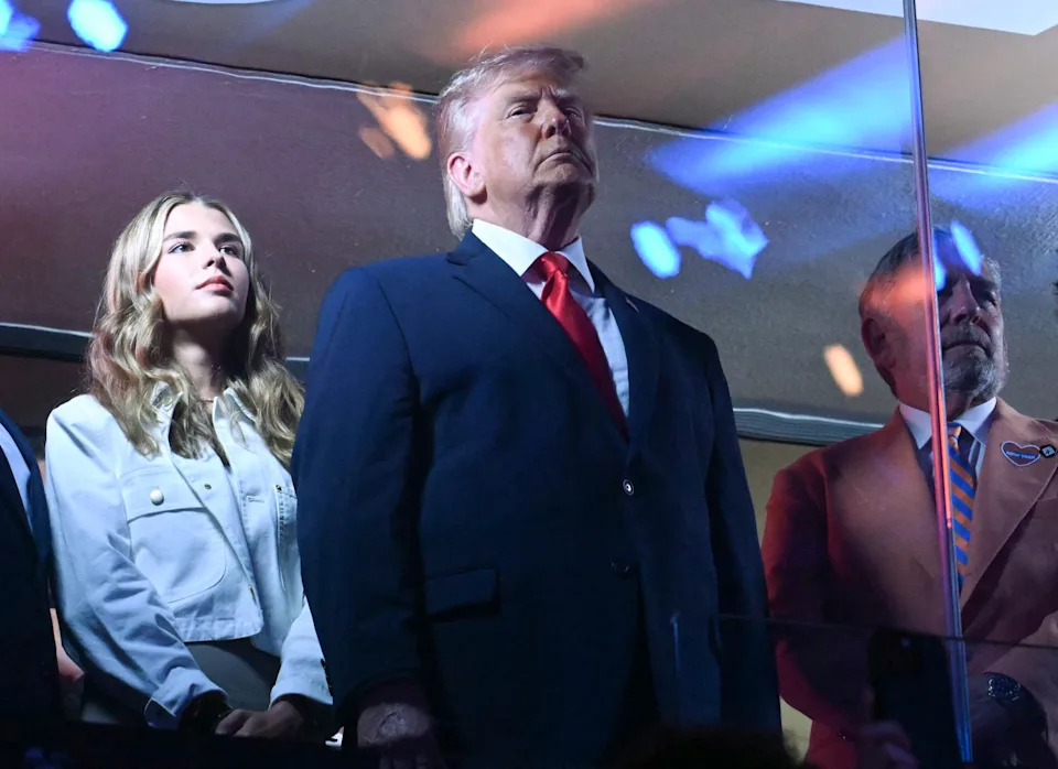 From left, Kai Trump, President Trump and Knicks owner James Dolan